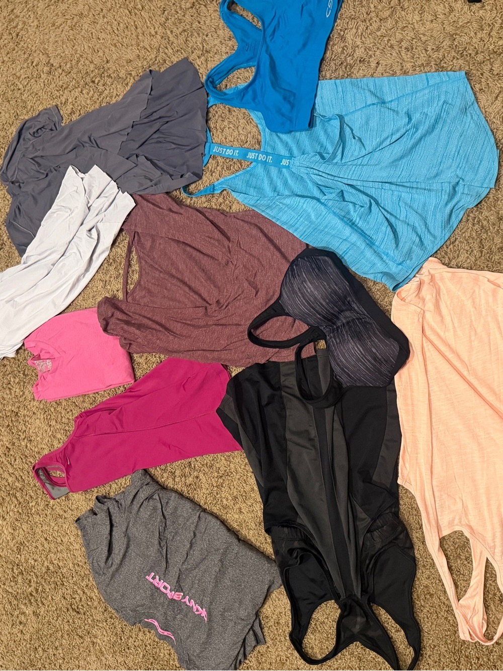 12 Pieces (2 sports bras, 10 workout shirts)